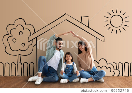 Loving middle eastern parents making roof over their daughter Loving middle eastern parents making roof over their daughter 99252746