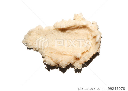 Sugar scrub texture smear isolated on white background. Beauty cosmetic smudge such as salt scrub, lip balm, body skincare cream, top view with shadow. 99253078