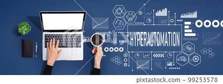 Hyperautomation theme with person using laptop computer 99253578