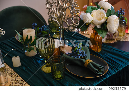 The luxury served table indoors in green colors 99253579