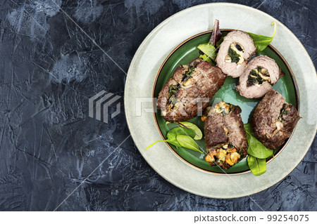 Beef rolls with mushrooms and spinach. Beef rolls with mushrooms and spinach. 99254075