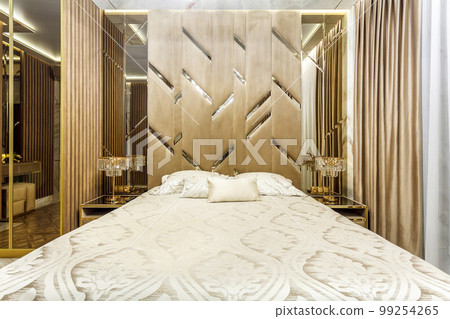 Luxury bedroom interior with parquet and mirror walls Luxury bedroom interior with parquet and mirror walls 99254265