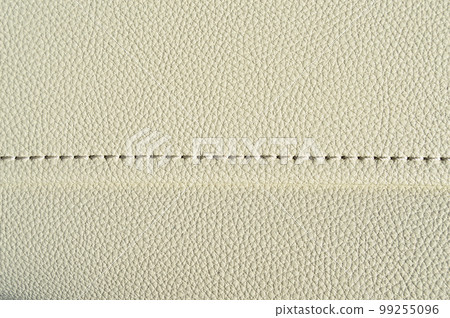 Imitation cowhide texture close up, stitched beige cowhide texture can be background Imitation cowhide texture close up, stitched beige cowhide texture can be background 99255096