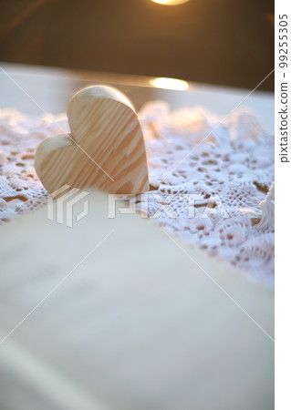 Valentines Day - Wooden Heart With Defocused Blurred Lights. Love concept Valentines Day - Wooden Heart With Defocused Blurred Lights. Love concept 99255305