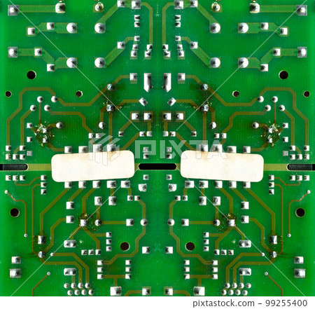 Hi-tech electronic circuit board detail background shot 99255400
