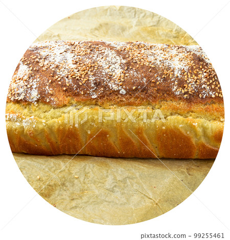 Fresh nutritious and golden colored bread homemade, isolated on beige paper 99255461