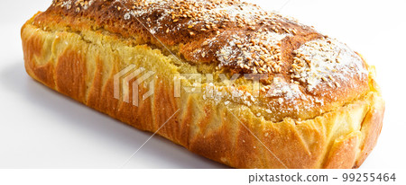 Fresh nutritious and golden colored bread homemade, isolated on white background 99255464