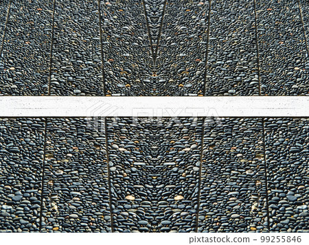 Wall texture decorated with blue pebbles, pebbles glued to the wall Wall texture decorated with blue pebbles, pebbles glued to the wall 99255846