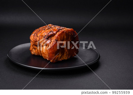 Delicious fresh smoked meat or ham with spices and herbs 99255939