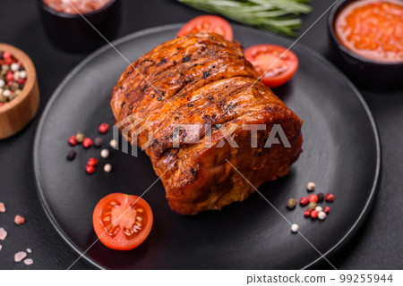 Delicious fresh smoked meat or ham with spices and herbs Delicious fresh smoked meat or ham with spices and herbs 99255944