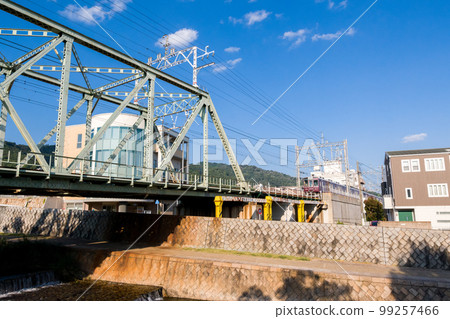 [Hankyu Kobe Main Line] Limited Express Train on the Kobe Line Crossing the Sumiyoshi River 99257466