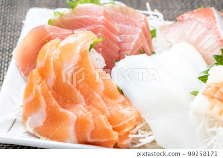 Assorted sashimi up. 99258171