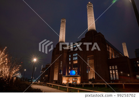 New Battersea Power Station in London England UK at night operating as a new shopping mall and cinema in newly opened residential and public centre in Battersea, London. 99258702