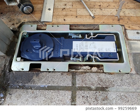 Floor hinge of the swing door replaced with a new one Floor hinge of the swing door replaced with a new one 99259669