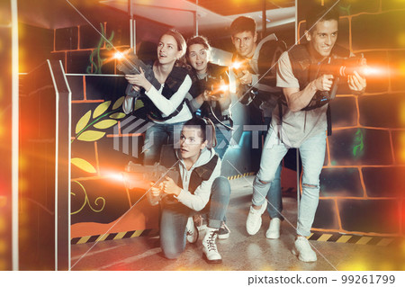 Glad people posing with laser guns 99261799