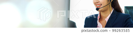 Business people wearing headset working in office in widen view Business people wearing headset working in office in widen view 99263585