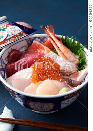 Bowl of rice topped with sashimi Bowl of rice topped with sashimi 99264832