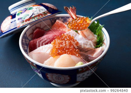 Seafood rice bowl topped with salmon roe 99264840