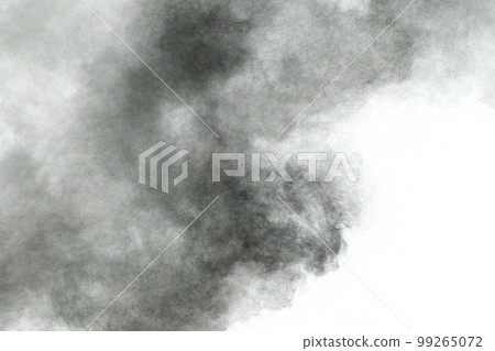Black particles splattered on white background. Black powder dust splashing. Black particles splattered on white background. Black powder dust splashing. 99265072