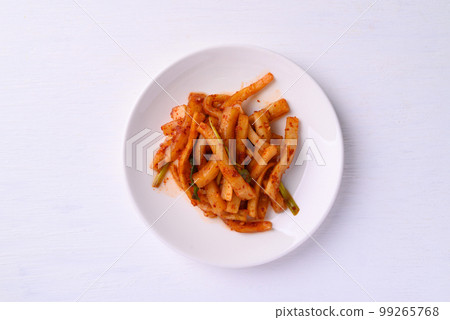 Kimchi radish on white background, Korean food homemade side dish, Top view 99265768