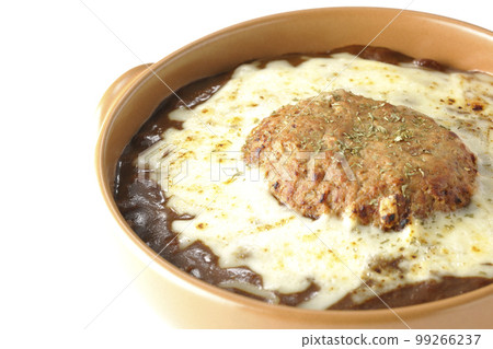 A grilled curry with plenty of cheese and hamburger on a white background A grilled curry with plenty of cheese and hamburger on a white background 99266237