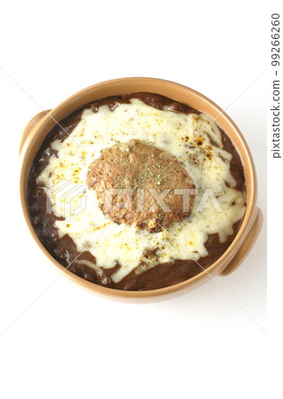 A bird's-eye view shot of grilled curry with plenty of cheese and hamburger on a white background 99266260