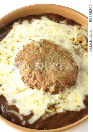A bird's-eye view shot of grilled curry with plenty of cheese and hamburger on a white background 99266263