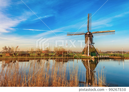 Rotterdam Netherlands, nature landscape of Dutch Windmill at Kinderdijk Village Rotterdam Netherlands, nature landscape of Dutch Windmill at Kinderdijk Village 99267838