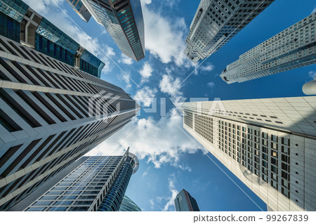 Singapore, city skyline looking up under skyscraper building business district Singapore, city skyline looking up under skyscraper building business district 99267839