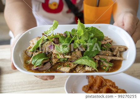 Spicy Grilled Pork Salad (Moo Yang Nam Tok) 99270255