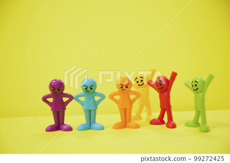 Angry man and happy colorful doll Angry man and happy colorful doll 99272425