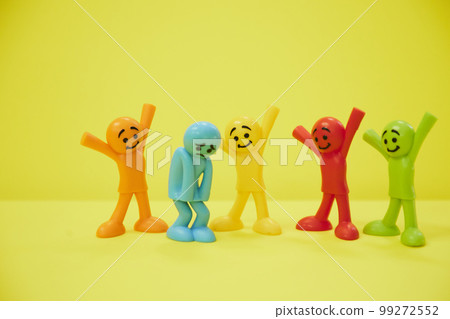 A colorful doll that looks happy to comfort a depressed person 99272552