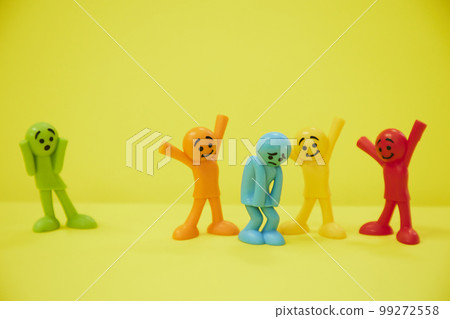 A colorful doll that looks happy to comfort a depressed person 99272558