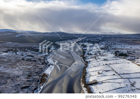 Aerial view of snow covered Gweebarra River between Doochary and Lettermacaward in Donegal - Ireland Aerial view of snow covered Gweebarra River between Doochary and Lettermacaward in Donegal - Ireland 99276348