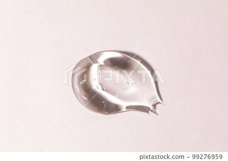 Swatches from various cosmetic products, drops of lotion, smears of creams, gels and scrubs on pink background Swatches from various cosmetic products, drops of lotion, smears of creams, gels and scrubs on pink background 99276959