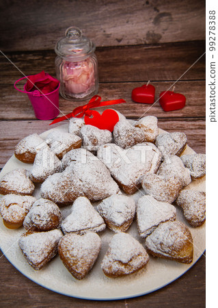 Recipe for soft heart-shaped doughnuts for Valentine's Day 99278388