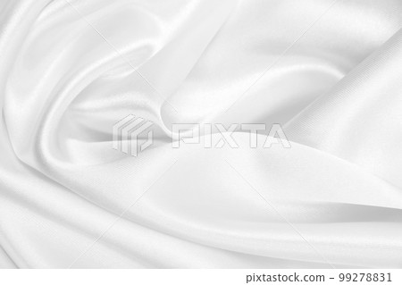 Smooth elegant white silk or satin luxury cloth texture as wedding background. Luxurious background design Smooth elegant white silk or satin luxury cloth texture as wedding background. Luxurious background design 99278831