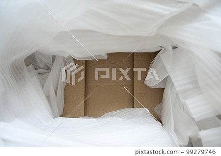 white wrap bubble put in brown box white wrap bubble put in brown box 99279746