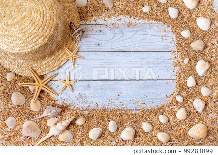 Sand seashells background. Summer time concept with sea shells and starfish on wooden background and sand Sand seashells background. Summer time concept with sea shells and starfish on wooden background and sand 99281099
