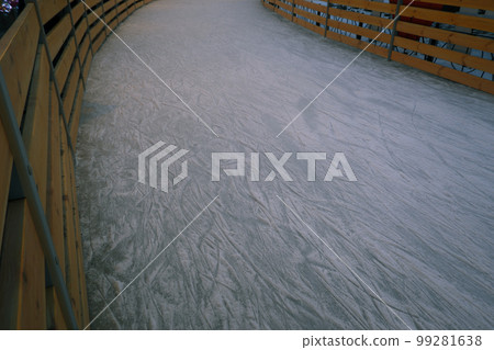 Ice texture on a skating rink. Winter background. Overhead view. Ice texture on a skating rink. Winter background. Overhead view. 99281638