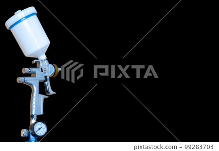 Paint spray on wooden floors Image of the painter's arm hand holding industrial size spray gun used for industrial painting and coating and isolated on background clipingpart 99283703