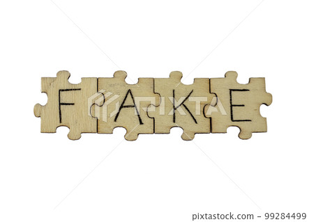 Learning FAKE. The hand lettering on the wooden puzzles is insulated on a white background. Learning FAKE. The hand lettering on the wooden puzzles is insulated on a white background. 99284499
