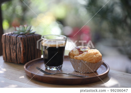 Coffee glass mug and bacon truffle Mayonnaise and cactus plant pot outdoor chill relaxing Coffee glass mug and bacon truffle Mayonnaise and cactus plant pot outdoor chill relaxing 99286047