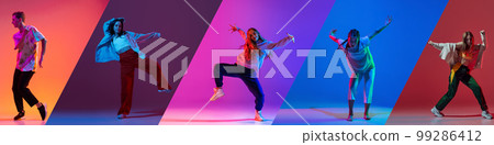 Music in moves. Young expressive contemp dance dancers dancing in neon light. Concept of dance, youth, hobby, dynamics, movement, action, ad. Banner with copy space 99286412