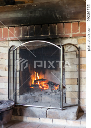 fireplace in mountain hut fireplace in mountain hut 99286765