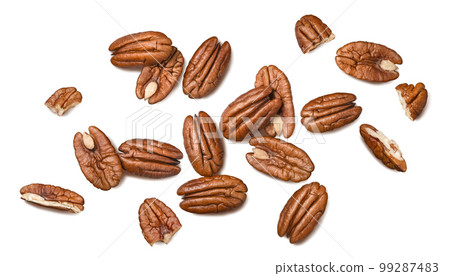 Pecans isolated on white background. Nuts scattered. Top view. 99287483