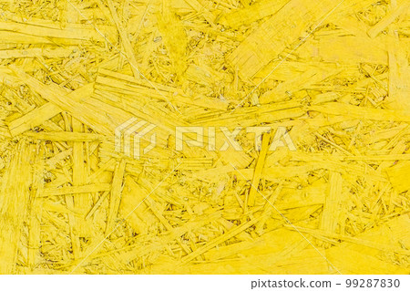 Yellow paint pressed wood texture, chipboard light bright vibrant surface background osb particleboard 99287830