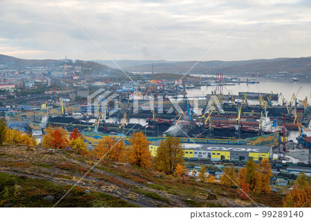 MURMANSK, RUSSIA - SEPTEMBER 17, 2021: Murmansk commercial sea port. Kola bay. MURMANSK, RUSSIA - SEPTEMBER 17, 2021: Murmansk commercial sea port. Kola bay. 99289140
