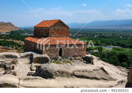 The Uplistsikhe 9th 10th century three-nave basilica and vale of Mtkvari river. The Uplistsikhe 9th 10th century three-nave basilica and vale of Mtkvari river. 99289201