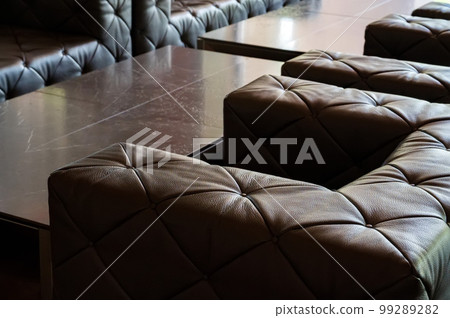 Sofa material made of leather with an elegant brown color. 99289282